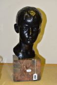 A BRONZE BUST OF A BOY, EUGENE ABBOTT, WHO LOST HIS LIFE ON THE TITANIC, signed W.F. And numbered