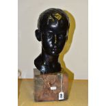 A BRONZE BUST OF A BOY, EUGENE ABBOTT, WHO LOST HIS LIFE ON THE TITANIC, signed W.F. And numbered