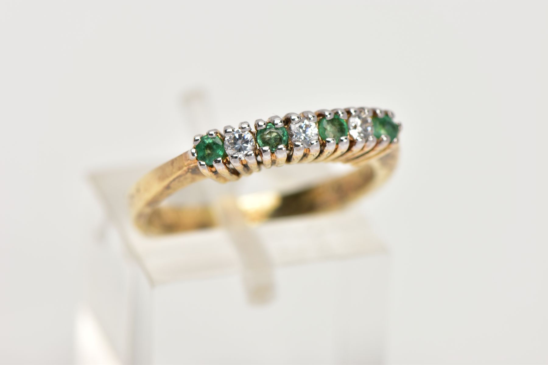 A GOLD-PLATED EMERALD AND CUBIC ZIRCONIA HALF ETERNITY RING, designed with a row of claw set, - Image 4 of 4