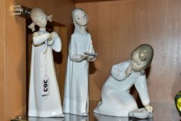 THREE LLADRO FIGURES OF CHILDREN IN NIGHT DRESSES, comprising 4868 'Girl with Candlestick' and