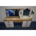 AN OAK AND PARTIALLY WHITE DRESSING TABLE, with seven drawers and a separate rectangular mirror on a