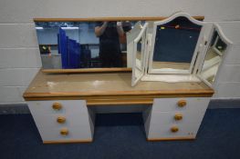 AN OAK AND PARTIALLY WHITE DRESSING TABLE, with seven drawers and a separate rectangular mirror on a