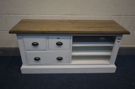 A PARTIALLY PAINTED AND HARDWOOD TOPPED TV STAND with three drawers and open shelves, width 120cm