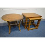 AN ERCOL GOLDEN DAWN CIRCULAR OCCASIONAL TABLE with a glass undershelf, diameter 60cm x height