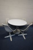 MAURICE BURKE FOR ARKANA, a 1960's tulip circular dining table, diameter 106cm x height 72cm and