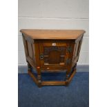 AN OLD CHARM OAK SINGLE DOOR CREDENCE CABINET, width 81cm x depth 33cm x height 71cm