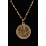 A 9CT PENDANT NECKLACE, the circular St. Christopher pendant hallmarked 9ct gold Birmingham,