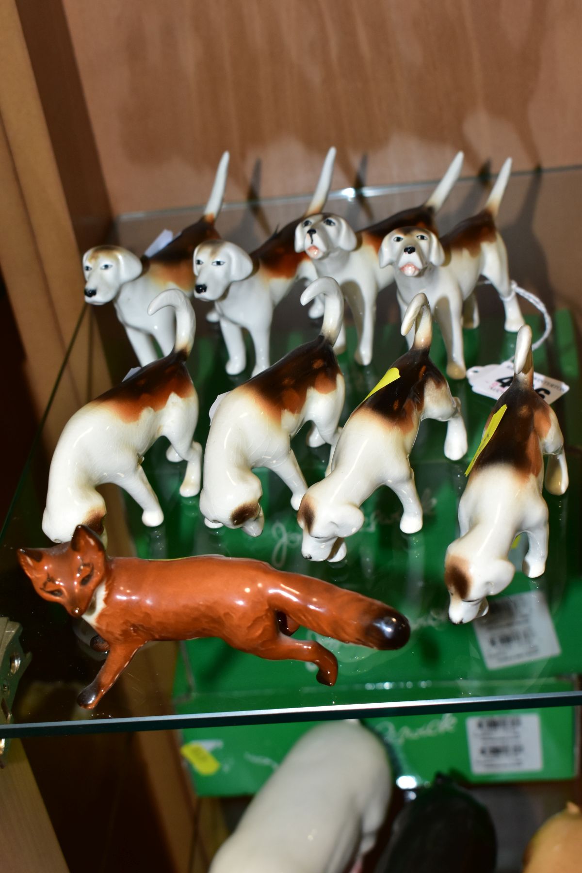 TWO SETS OF FOUR BESWICK FOXHOUNDS, first editions No 941 (x2) (one with reglued leg), No 942 (