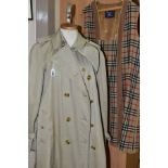 A LADIES BURBERRY TRENCH COAT, with detachable wool lining, approximate size 16/18 (staining to