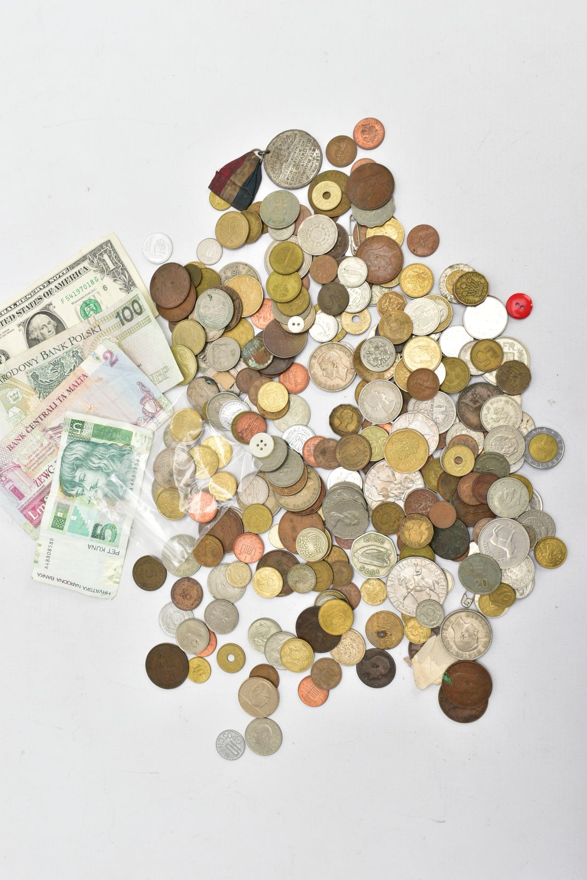 A SMALL BOX OF WORLD COINS, some euro coin and small amount of silver and banknotes