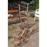 A VINTAGE SLINGSBY RAILWAY PORTERS SACK TRUCK along with a quantity of garden tools (10)