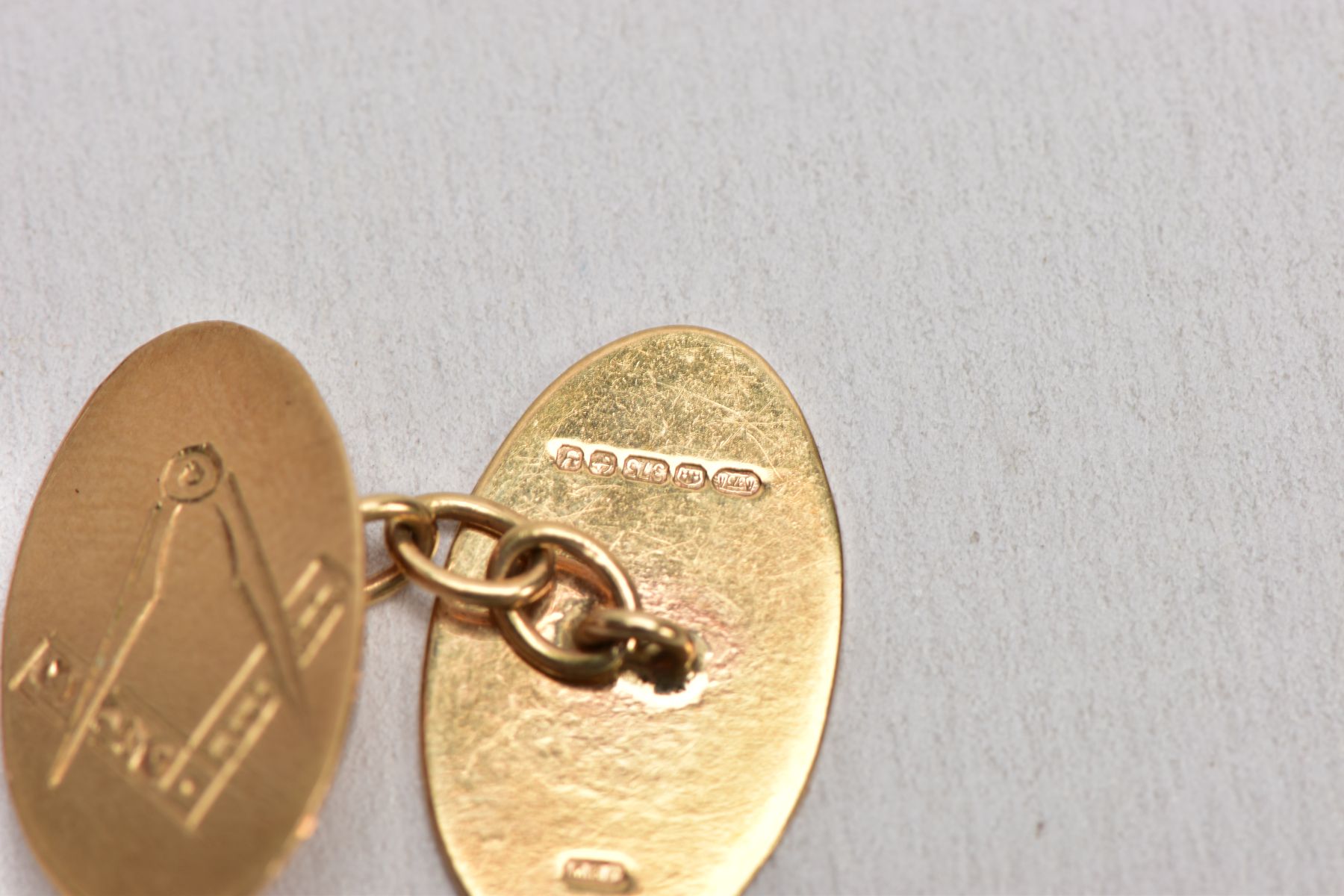 A SINGLE 9CT GOLD CUFFLINK AND YELLOW METAL ITEMS, the cufflink with and engraved masonic design, - Image 3 of 6