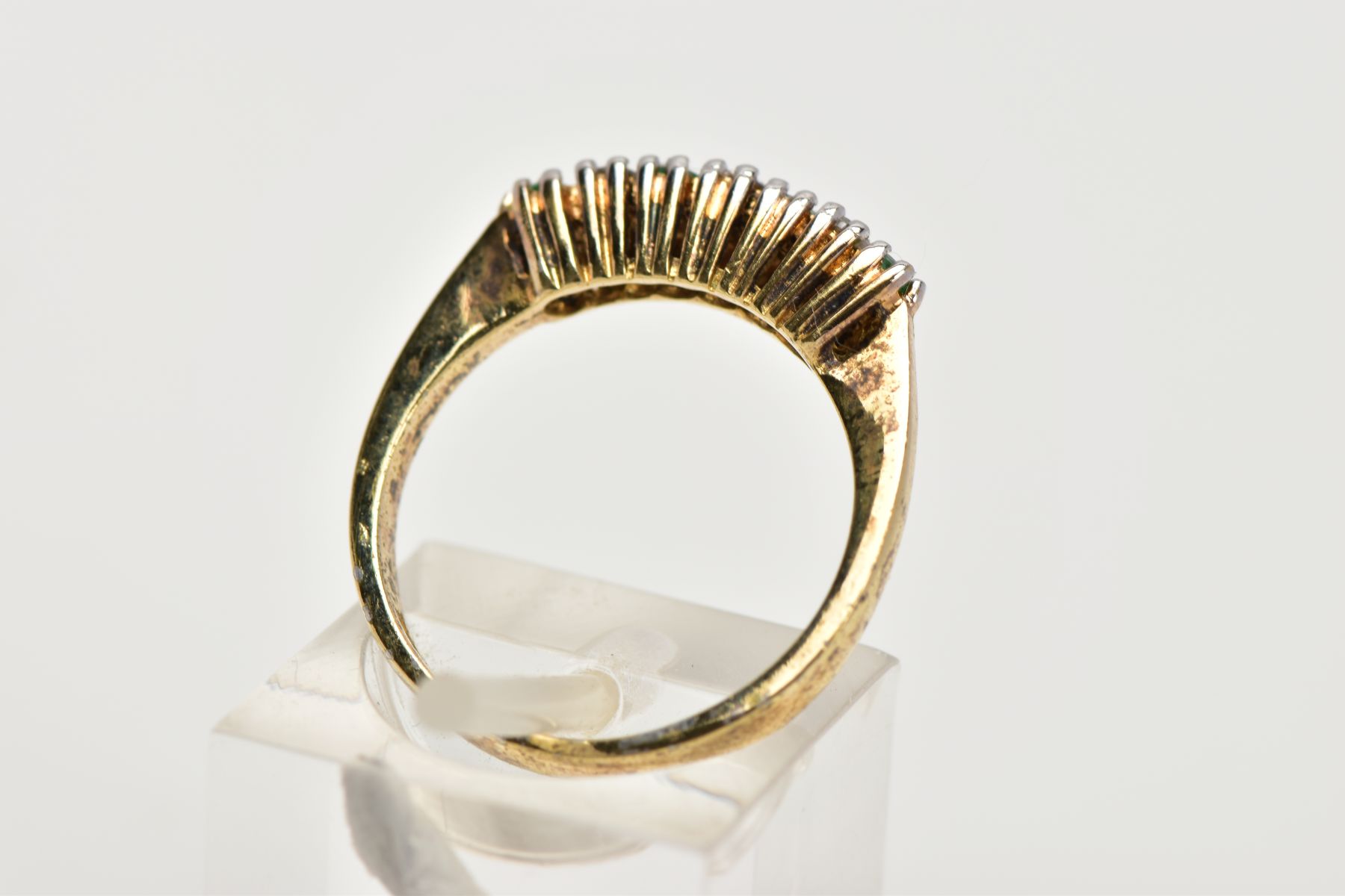 A GOLD-PLATED EMERALD AND CUBIC ZIRCONIA HALF ETERNITY RING, designed with a row of claw set, - Image 3 of 4