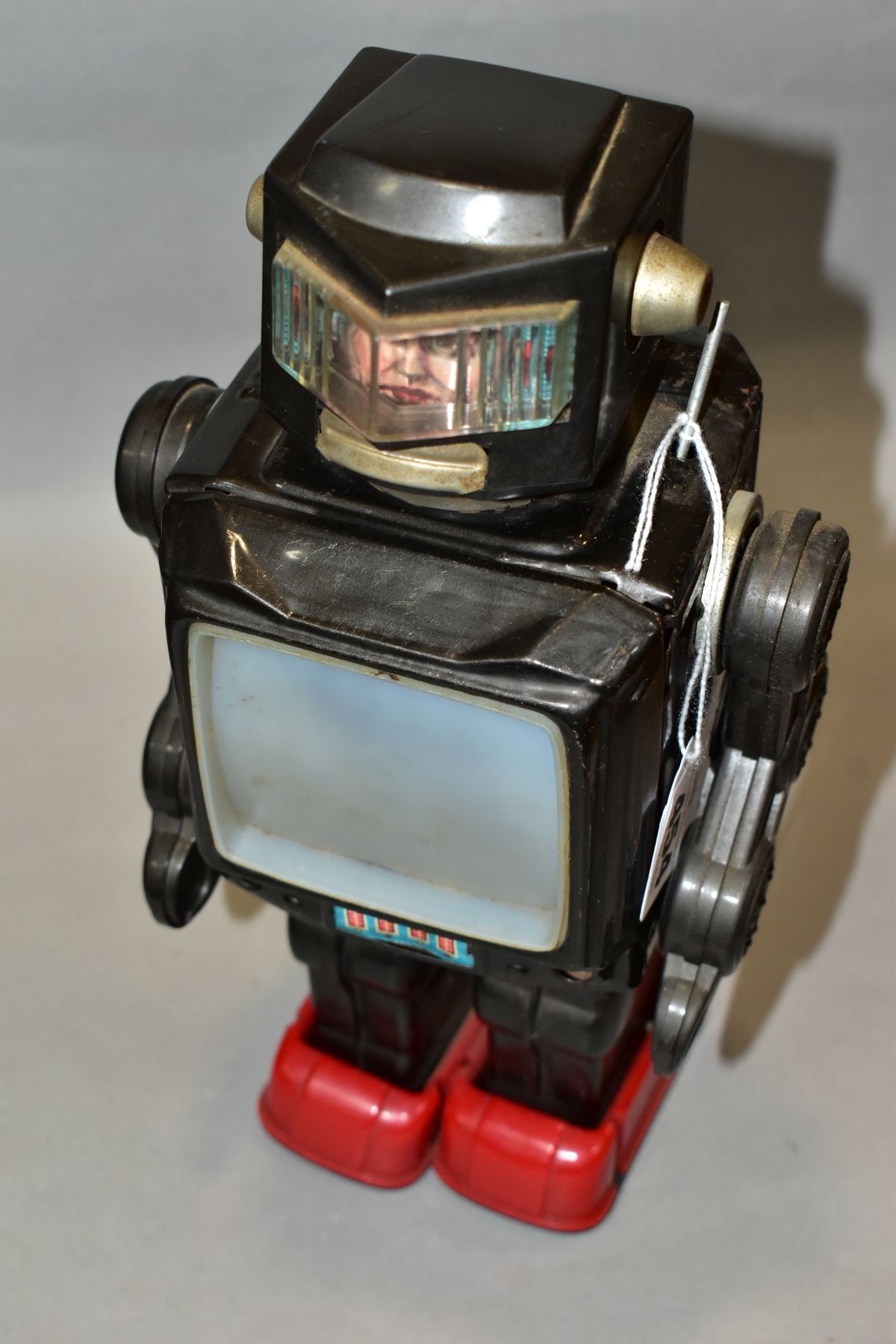 A TINPLATE AND PLASTIC BATTERY OPERATED TV ROBOT, marked 'Made in Japan' but no makers marking, - Image 6 of 7