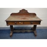 A VICTORIAN FLAME MAHOGANY WASHSTAND, with a shaped raised back, two frieze drawers, on tapered