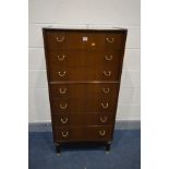 A TALL G PLAN LIBRENZA AFROMOSIA TEAK CHEST OF SEVEN DRAWERS, width 61cm x depth 41cm x height 128cm