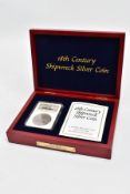 A SLABBED NGC SHIPWRECK CERTIFICATION OF A 18TH CENTURY 1782 SILVER EIGHT REALES COIN with