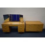 A MID 20TH CENTURY TEAK EFFECT TWO PIECE BEDROOM SUITE, comprising a chest of two short over two