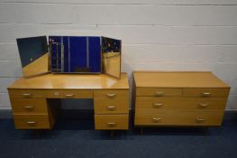 A MID 20TH CENTURY TEAK EFFECT TWO PIECE BEDROOM SUITE, comprising a chest of two short over two