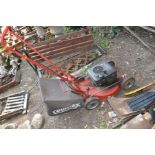 A COUNTAX PETROL LAWN MOWER with a Briggs and Stratton Quantum 35 engine ( in rusted condition ,