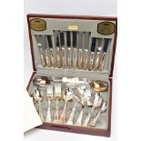 A COMPLETE CANTEEN OF VINERS SILVER-PLATED CUTLERY, wooden canteen opens to reveal a light blue