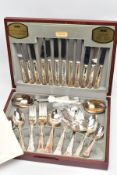 A COMPLETE CANTEEN OF VINERS SILVER-PLATED CUTLERY, wooden canteen opens to reveal a light blue