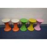 THREE TAM TAM CIRCULAR STOOLS, in three colours, along with a pair of similar stools stamped