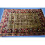 A LAHORE RED AND GOLD GROUND RUG, 198cm x 134cm