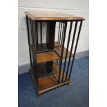 A LATE 20TH CENTURY MAHOGANY AND INLAID REVOLVING BOOKCASE, with two tiers on small bracket feet,