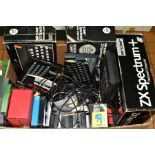 A BOX OF RETRO GAMING EQUIPMENT AND ACCESSORIES, including a boxed Sinclair ZX Spectrum+ computer