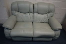 A PALE GREEN LA-Z-BOY MANUAL RECLINING SOFA, inner length 110cm x length 162cm