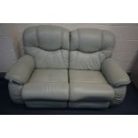 A PALE GREEN LA-Z-BOY MANUAL RECLINING SOFA, inner length 110cm x length 162cm