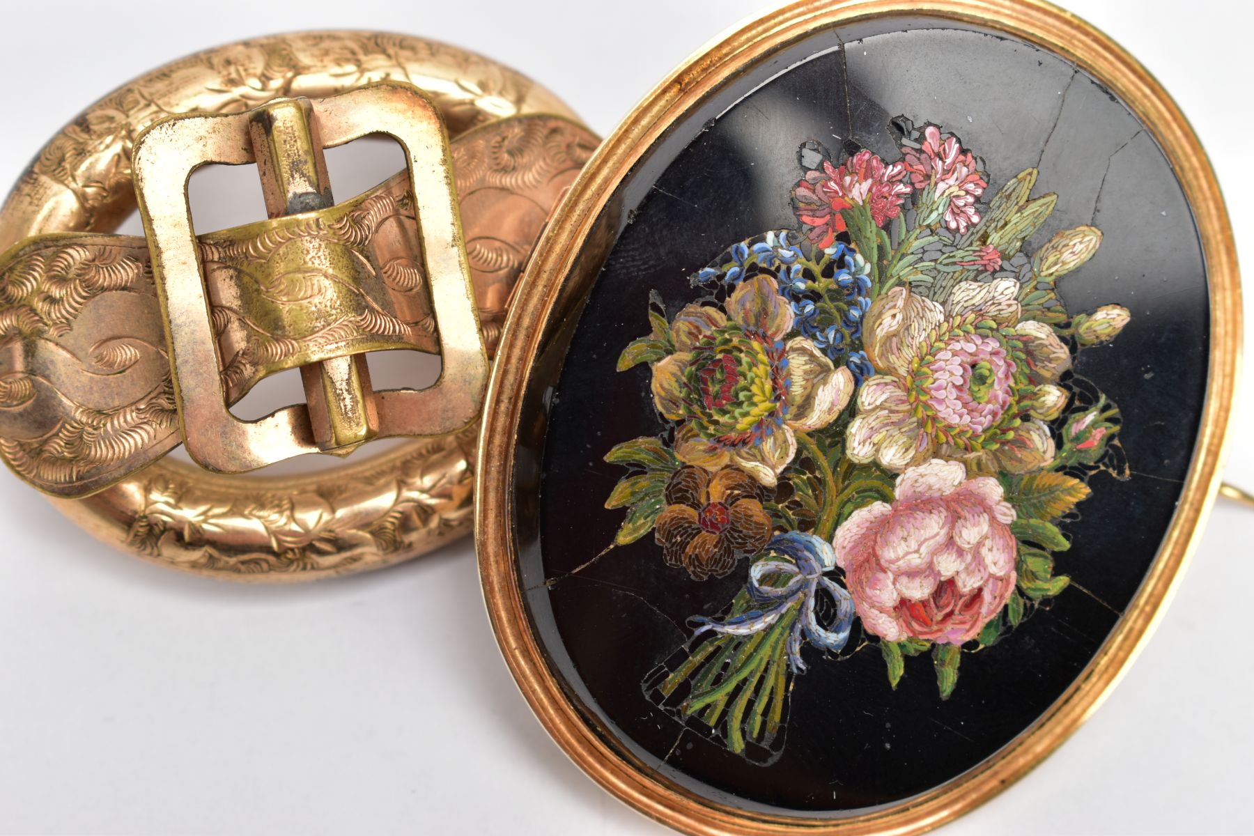 TWO VICTORIAN BROOCHES, to include a yellow metal hollow oval brooch with a foliate engraved belt - Image 3 of 3