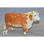 A BESWICK HEREFORD BULL, No 949, in red colourway, circular Beswick backstamp (Condition:- no
