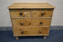 A VICTORIAN AND LATER PINE CHEST OF TWO OVER TWO LONG DRAWERS, turned handles and feet, width 82cm x