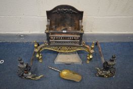 A CAST IRON AND BRASS FIRE GRATE with foliate brass apron and finials, width 63cm x depth 29cm x