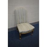 A 20TH CENTURY LOUIS XVI STYLE GILTWOOD BEDROOM CHAIR, on redded tapered legs, width 49cm x depth