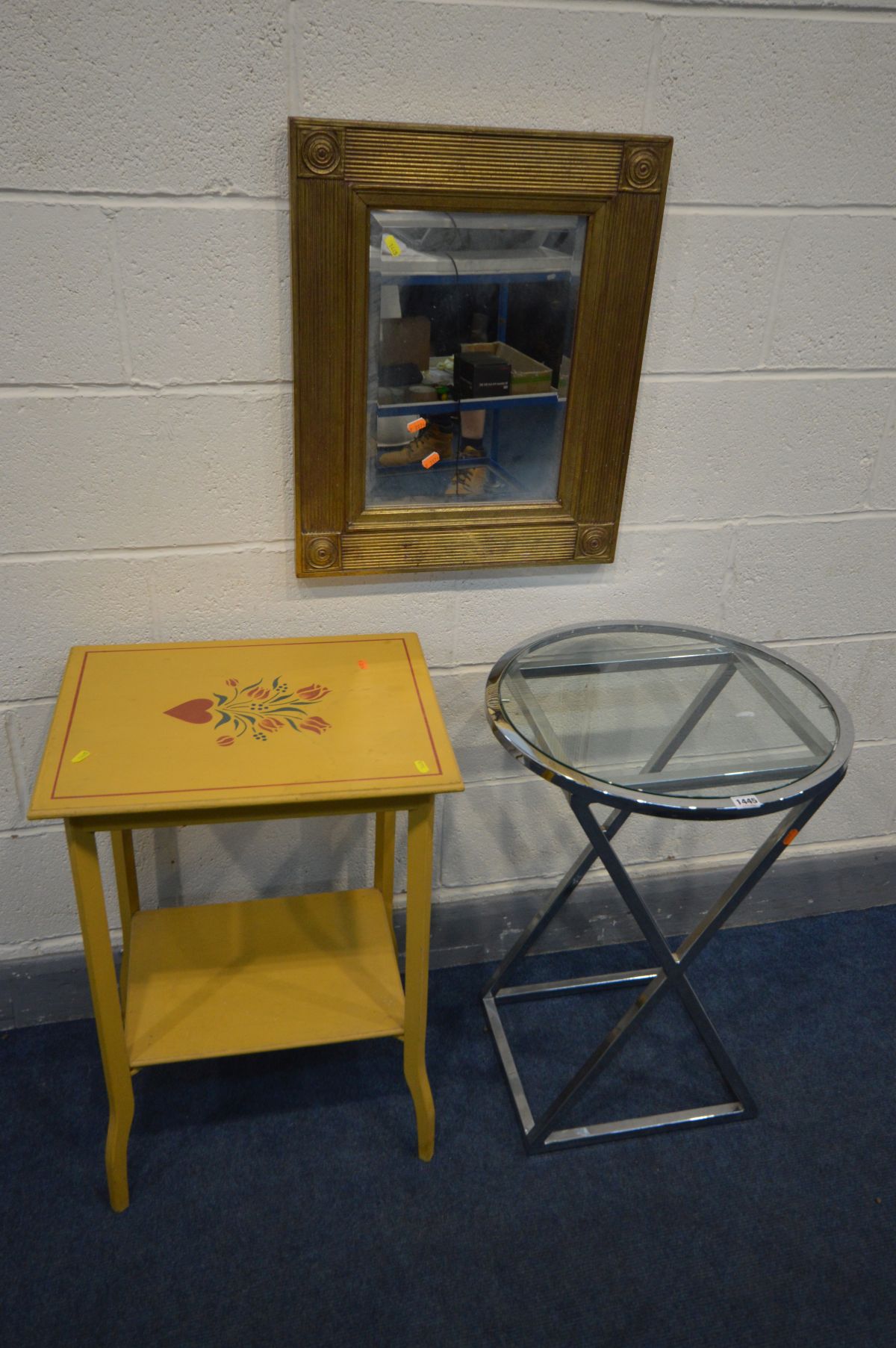 A MODERN CIRCULAR CHROME FRAMED OCCASSIONAL TABLE, diameter 50cm x height 70cm, a yellow painted