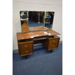 A G PLAN LIBRENZA AFROMOSIA TEAK DRESSING TABLE with triple mirrors and various drawers, width 125cm