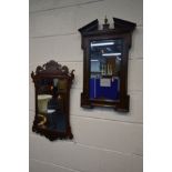 A GEORGIAN MAHOGANY FRETWORK WALL MIRROR, 42cm x 71cm along with an oak wall mirror with a