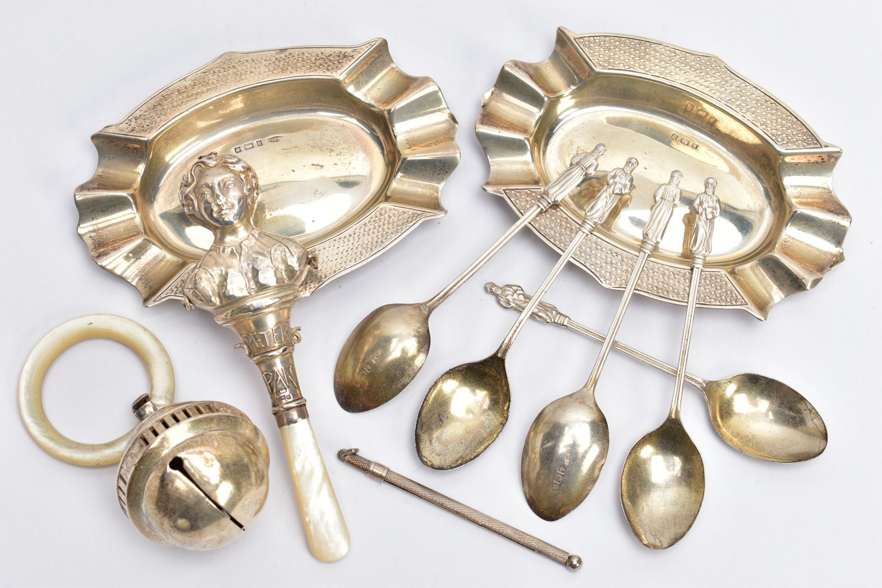 A SELECTION OF SILVER ITEMS, to include two silver oval shaped, engine turned design ashtrays,