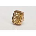 A VICTORIAN 9CT GOLD CITRINE FOB, of a rounded rectangular form set with a rectangular cut