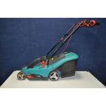 A BOSCH ROTAK 34 ELECTRIC LAWN MOWER with grass box ( PAT pass and working) short cable