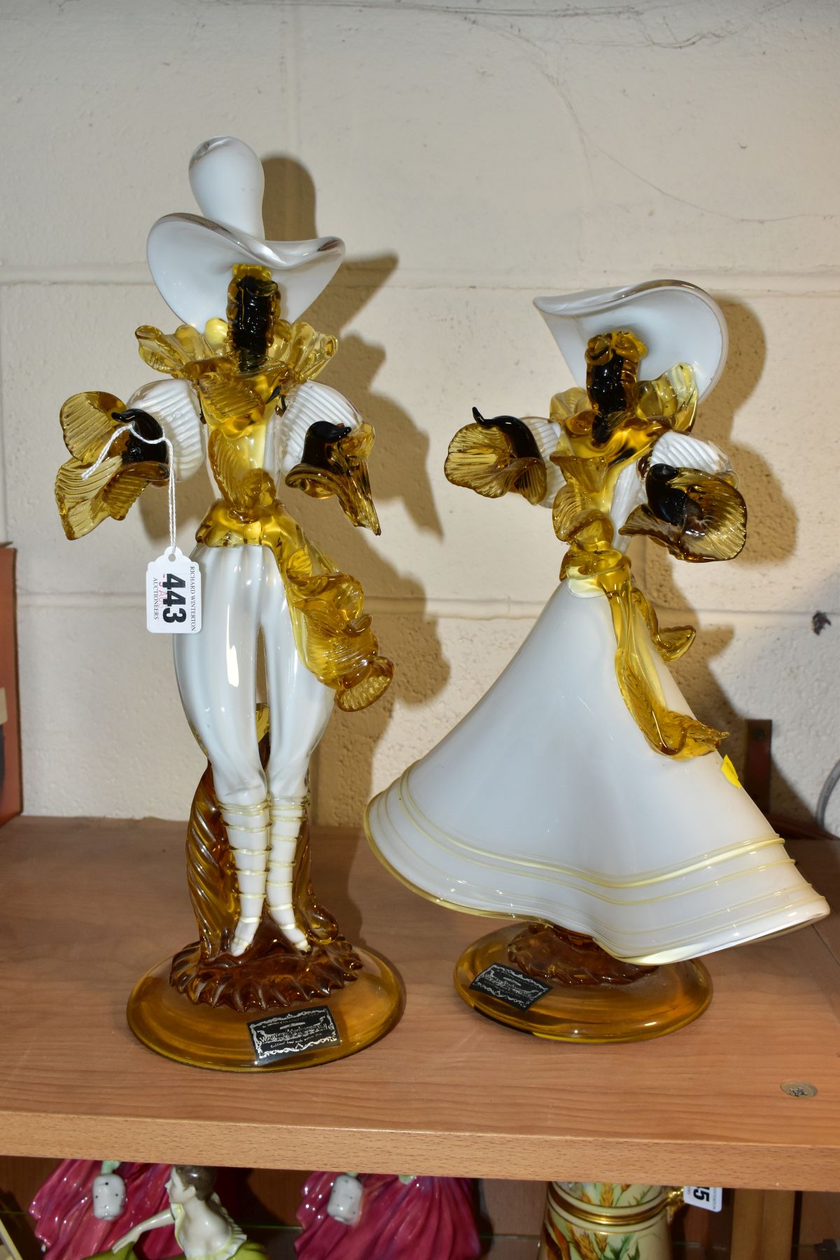 A PAIR OF VENETIAN GLASS COMPANY FIGURES OF A LADY AND GENTLEMAN, white, amber and black, both