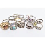 A BAG OF ASSORTED WHITE METAL RINGS, seventeen rings in total to include a silver gilt gents
