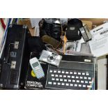 A BOX OF CAMERAS, TECHNOLOGY, etc, including a boxed Sinclair ZX Spectrum, a Crosley portable record