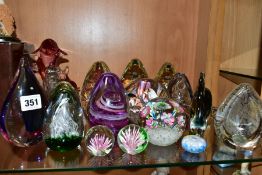 A GROUP OF SEVENTEEN MODERN GLASS PAPERWEIGHTS AND ORNAMENTS, mostly unbranded and of conical