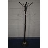 A MODERN COAT/HAT STAND on a marble base, height 170cm