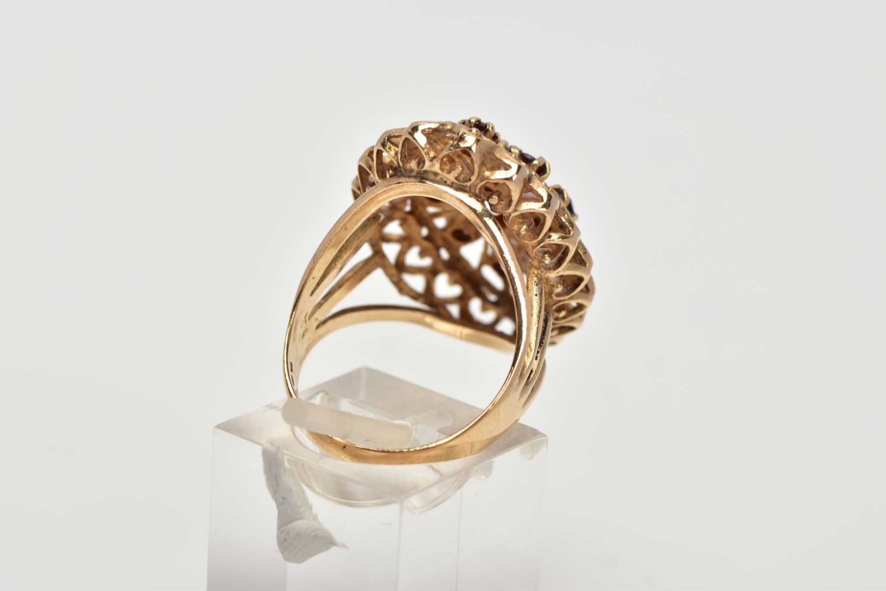 A 9CT GOLD GARNET DRESS RING, of a large openwork marquise shape, set with circular cut garnets, - Image 3 of 4