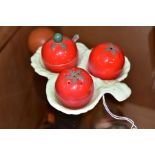 A CARLTONWARE NOVELY CRUET SET, shaped as tomatoes, to include salt, pepper, covered mustard pot